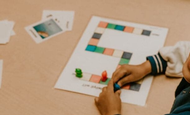 Child looking up at camera smiling