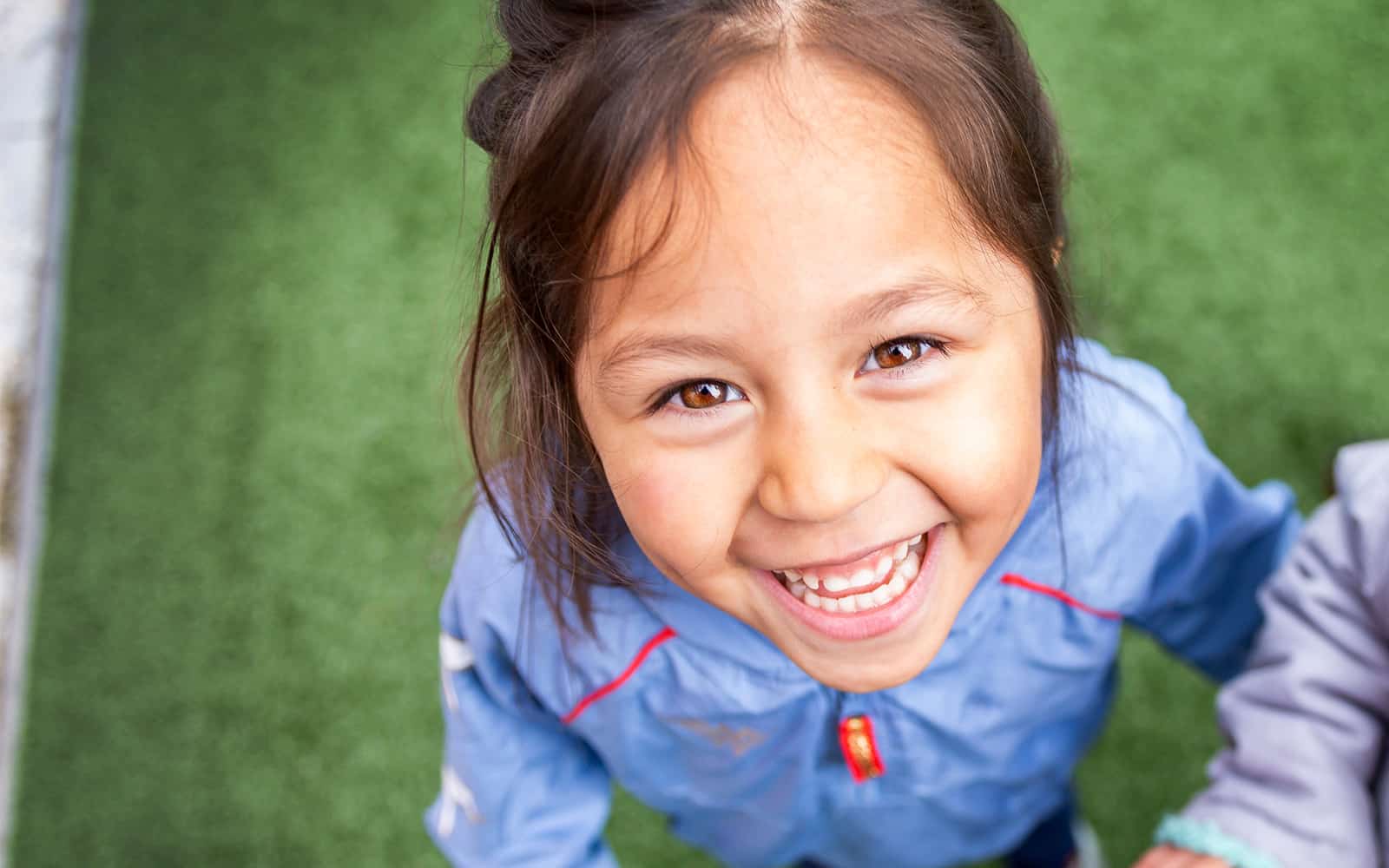 Child playing outside at school
